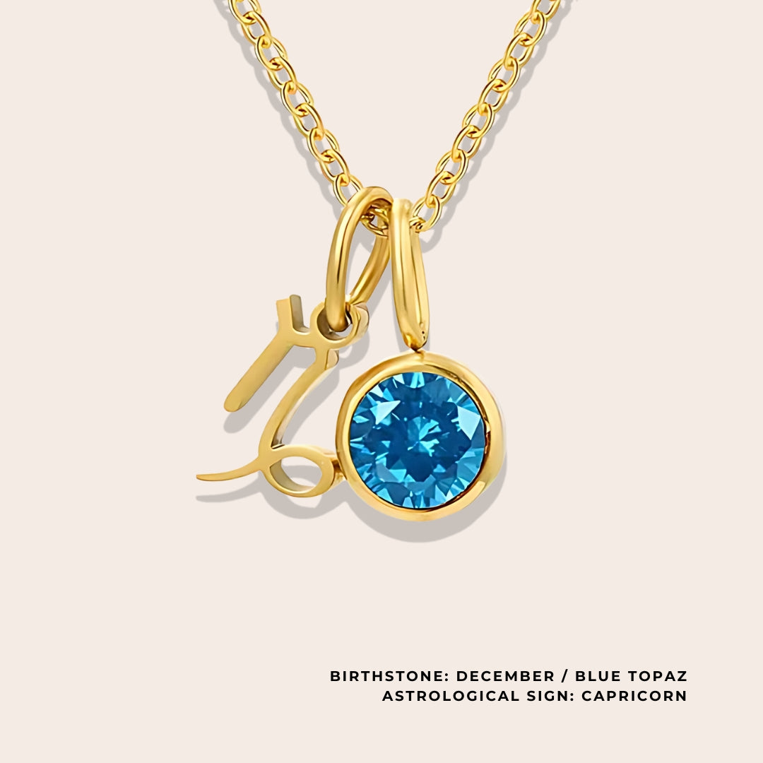 Astrological Birthstone Pendant December. Crafted from stainless steel and available in luxurious 14K gold, sleek silver, or rose gold plating, this necklace features your zodiac sign alongside your birthstone.