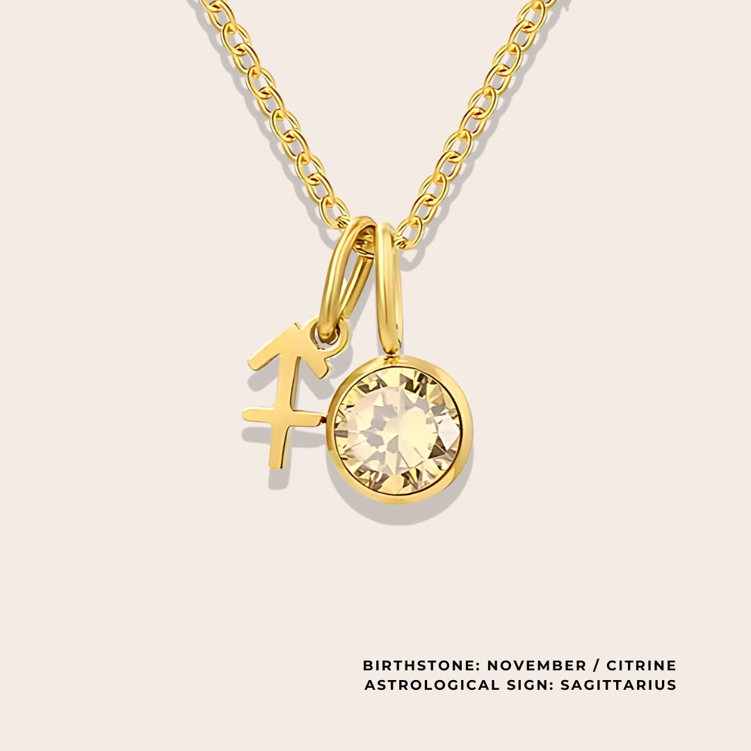 Astrological Birthstone Pendant November. Crafted from stainless steel and available in luxurious 14K gold, sleek silver, or rose gold plating, this necklace features your zodiac sign alongside your birthstone.