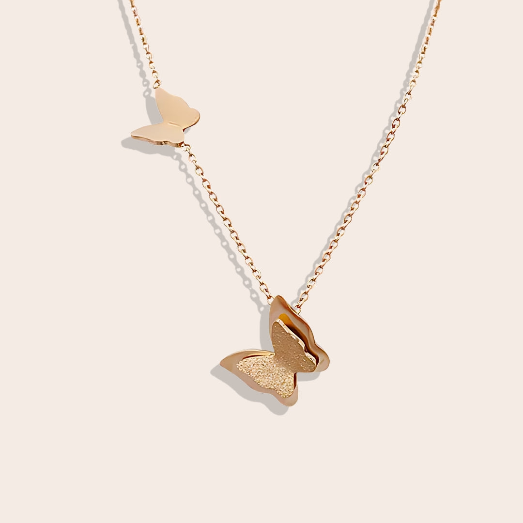 Belle Butterfly Necklace in rose gold. Crafted from durable stainless steel.