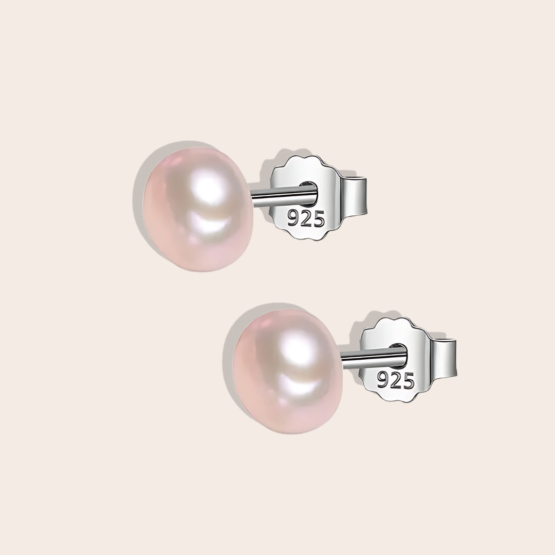 Bianca Baroque Pearl Studs in lavender. These stunning earrings feature unique freshwater pearls nestled in 925 sterling silver settings and plated with 18K gold.