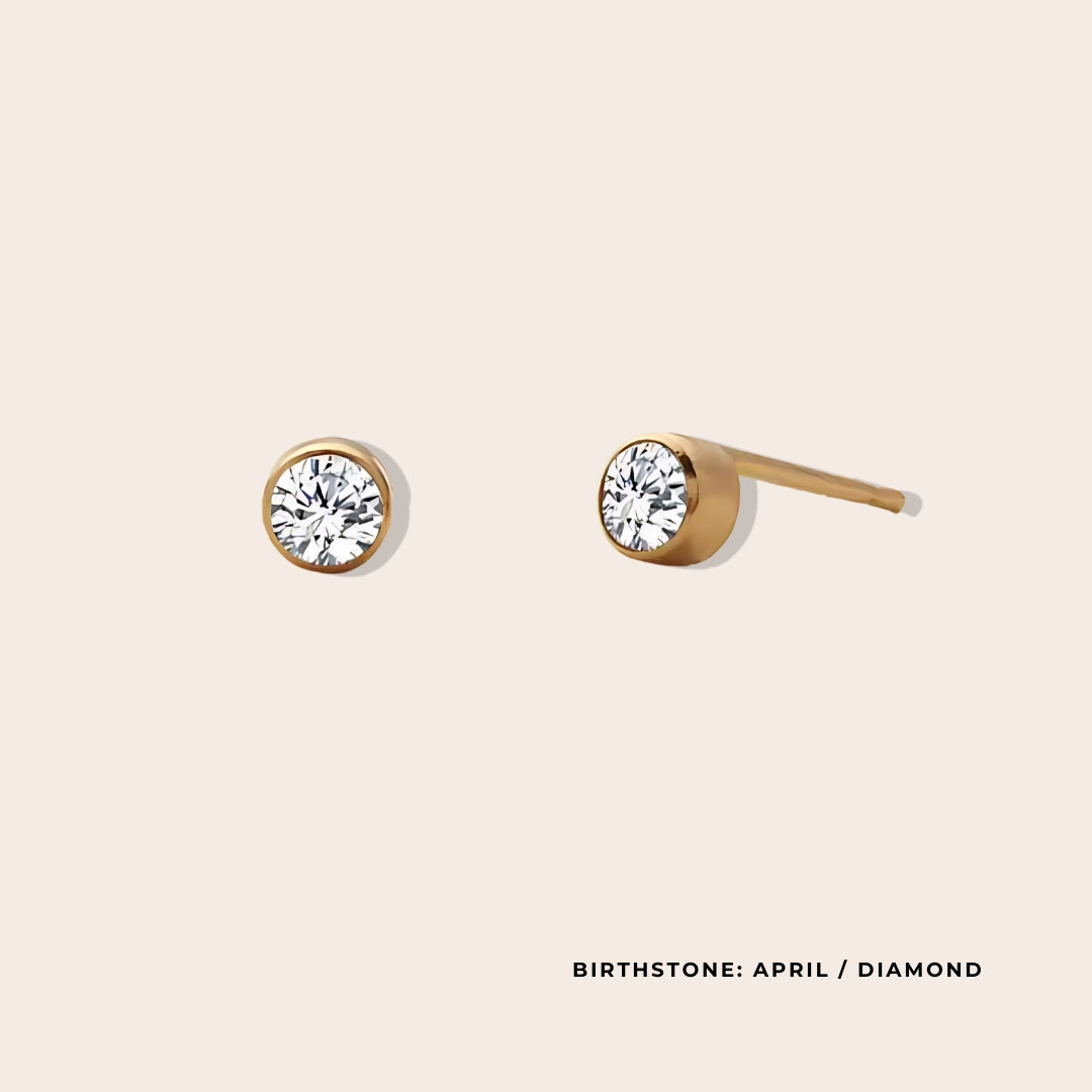 Birthstone Classic Studs April. Made from stainless steel and available in luxurious 14K gold, sleek silver, or rose gold plating, these stunning earrings feature Swarovski style crystals.