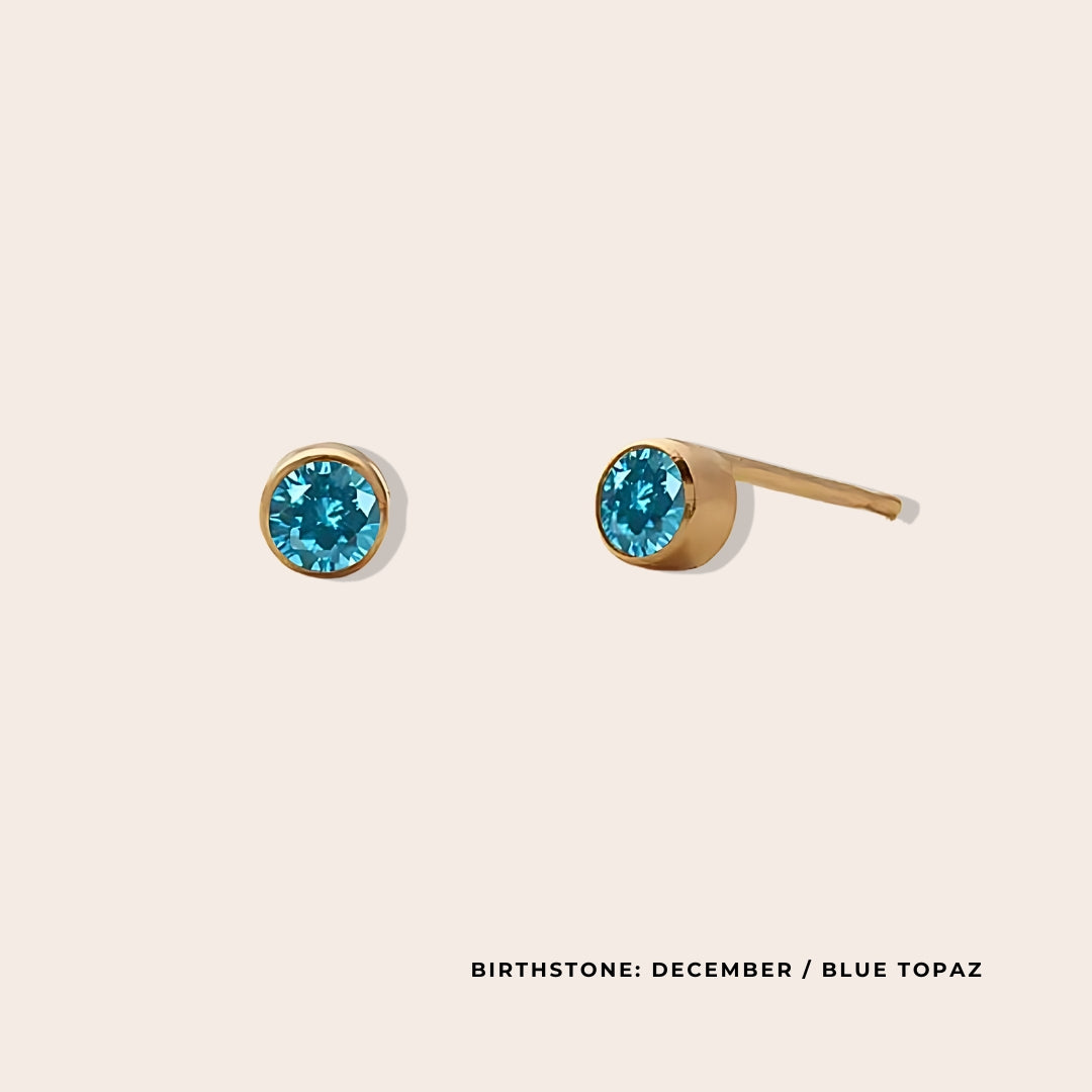 Birthstone Classic Studs December. Made from stainless steel and available in luxurious 14K gold, sleek silver, or rose gold plating, these stunning earrings feature Swarovski style crystals.