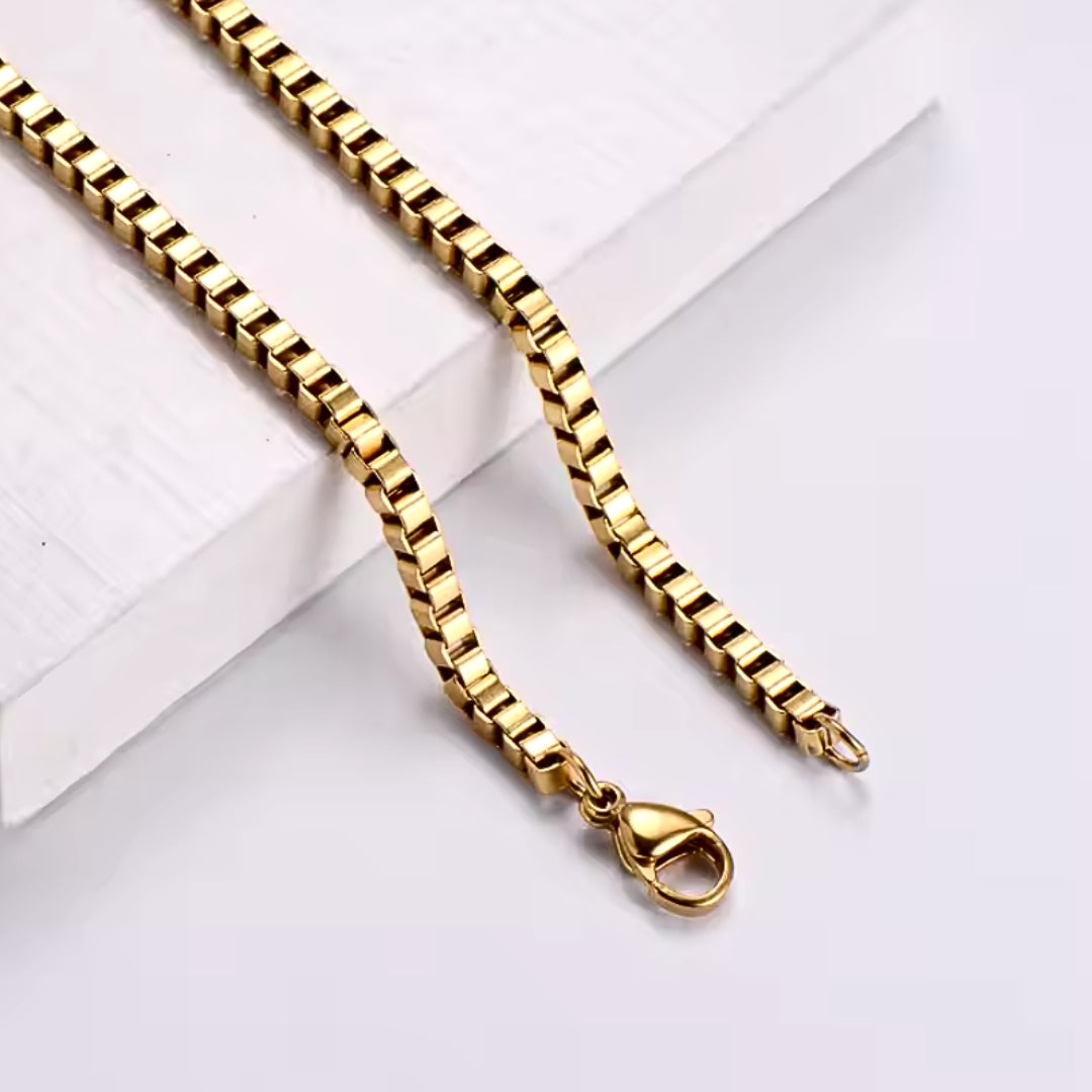 Brynn Box Chain Bracelet. Made with stainless steel and 14K plated gold. Lifestyle shot.