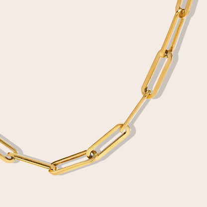 Cara Classic Paperclip Chain gold. Made from premium stainless steel and adorned with a radiant gold finish close up.