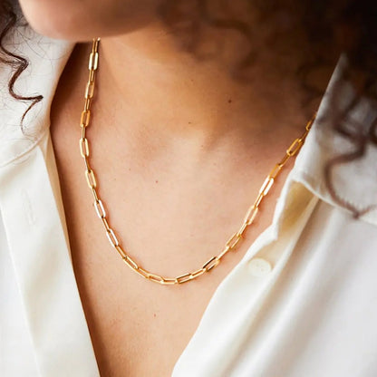 Cara Classic Paperclip Chain gold. Made from premium stainless steel and adorned with a radiant gold finish on model.