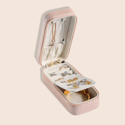 Chic Compact Jewelry Organizer in pink.