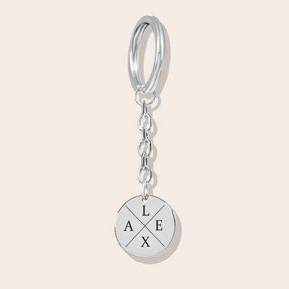 Personalized Couples Initials Coin Keychain in silver.