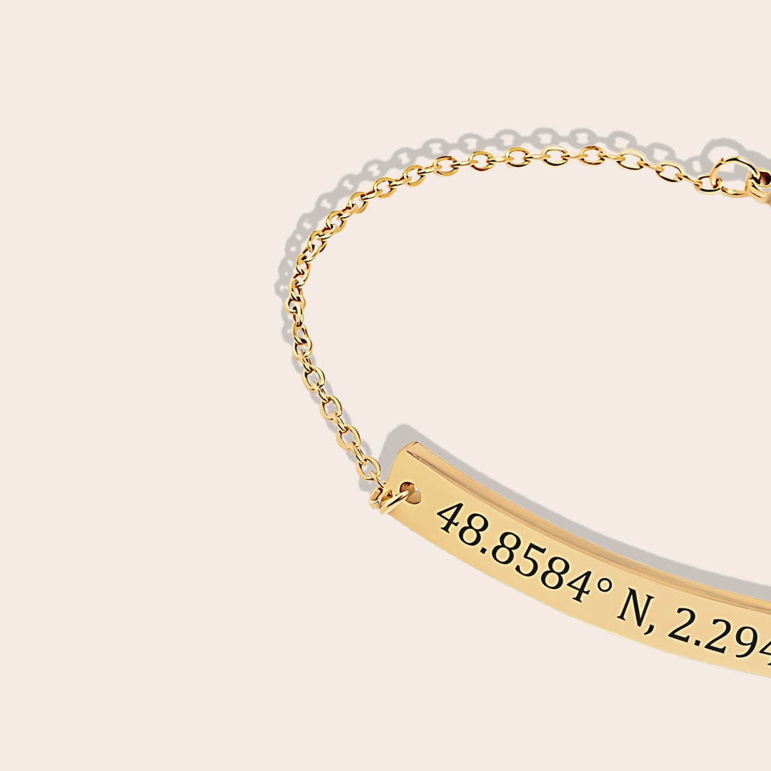 Clse up of Custom Coordinates Bracelet in gold. Lobster clasp, 18K plated stainless steel.