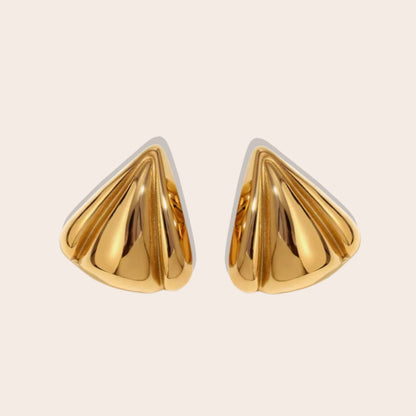 Dallas Delta Earrings. Made of stainless steel and lavishly coated in 18K PVD gold plating.