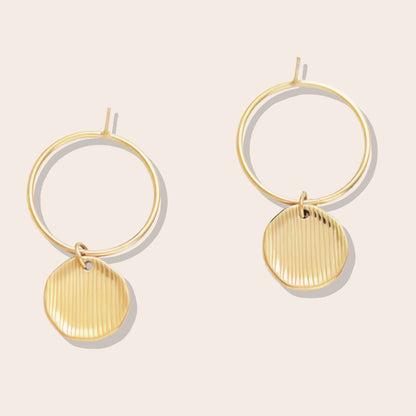 Dana Disc Earrings. Made from durable stainless steel and plated in 14K gold.