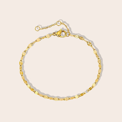 Danae Dapped Chain Anklet in gold. Crafted from stainless steel and plated in 14k gold.