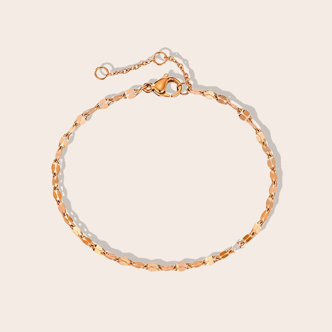 Danae Dapped Chain Anklet in rose gold. Crafted from stainless steel and plated in 14k gold.