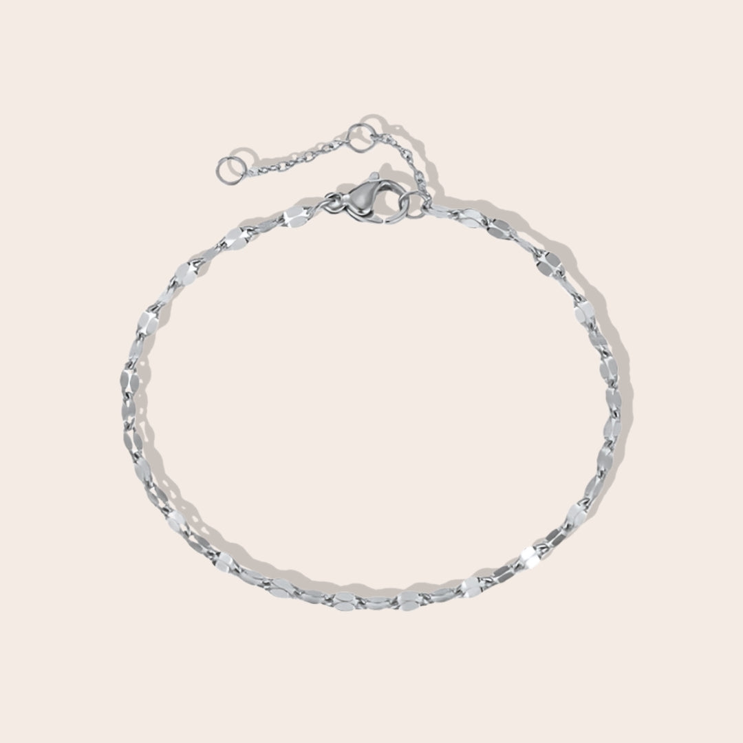 Danae Dapped Chain Anklet in silver. Crafted from stainless steel and plated in 14k gold.