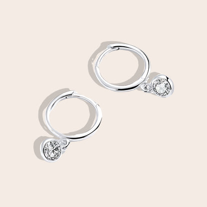 Dara Drop Huggies, featuring premium 925 sterling silver and pavé set cubic zirconia stones.