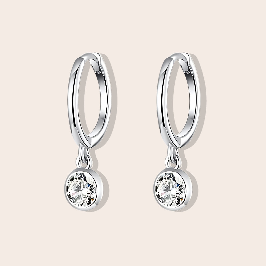 Dara Drop Huggies, featuring premium 925 sterling silver and pavé set cubic zirconia stones.