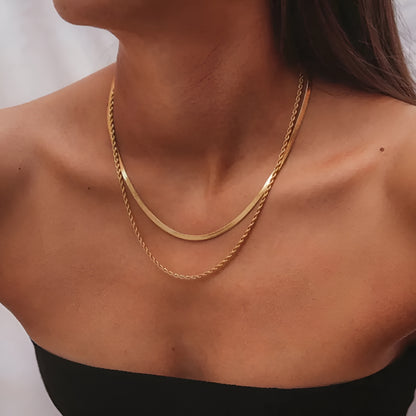 Dawn Dual Chain Necklace on model. 18K PVD Gold Stainless Steel.