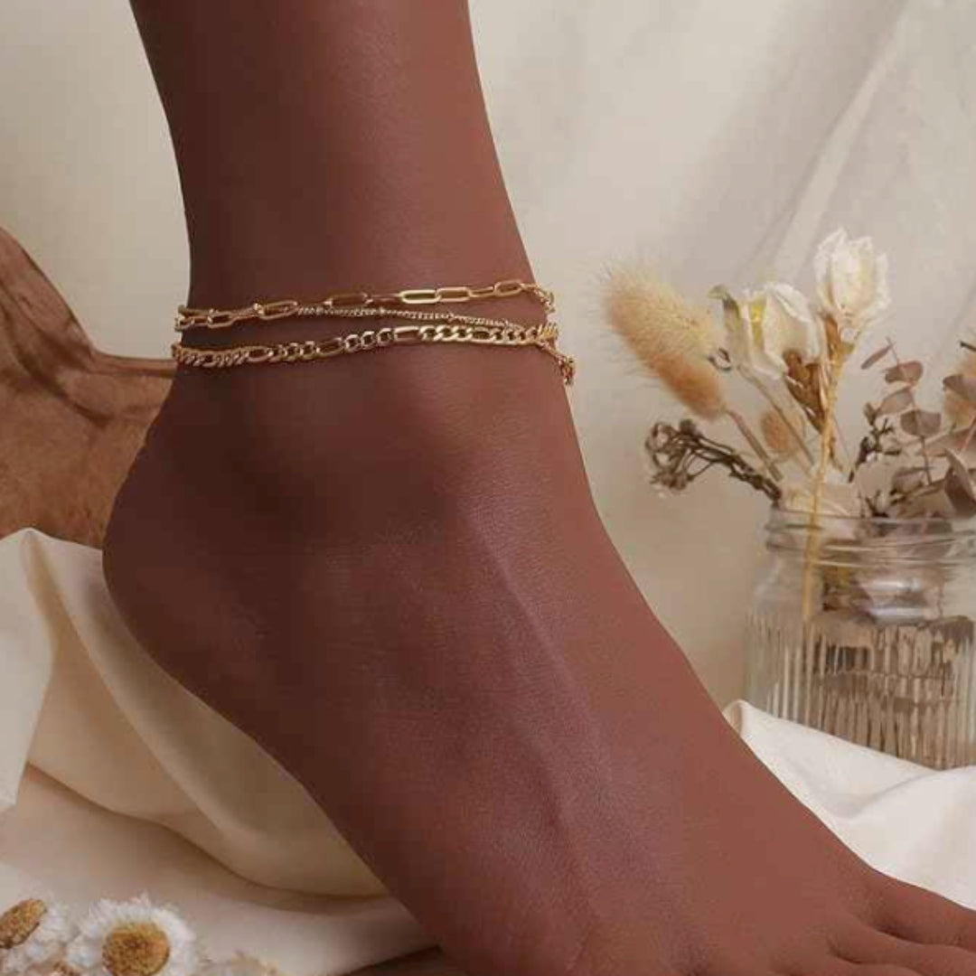 Devi Double Anklet Set in gold on model. Crafted from lasting stainless steel.