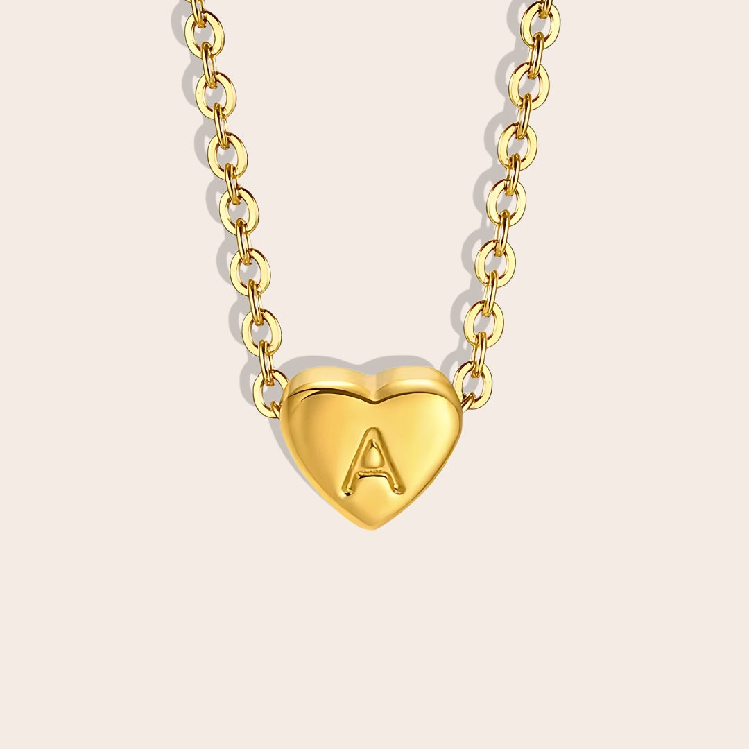 Hana Heartstrings Pendant, A. Made from stainless steel and enhanced with lustrous PVD plating.