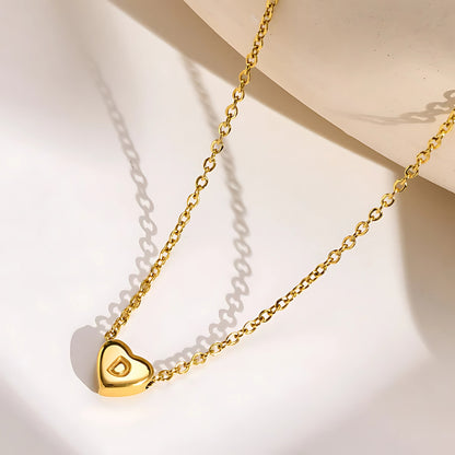 Hana Heartstrings Pendant, lifestyle shot 2. Made from stainless steel and enhanced with lustrous PVD plating.