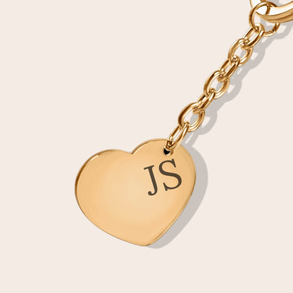 Close up of personalized Initials Heart Keychain in gold.