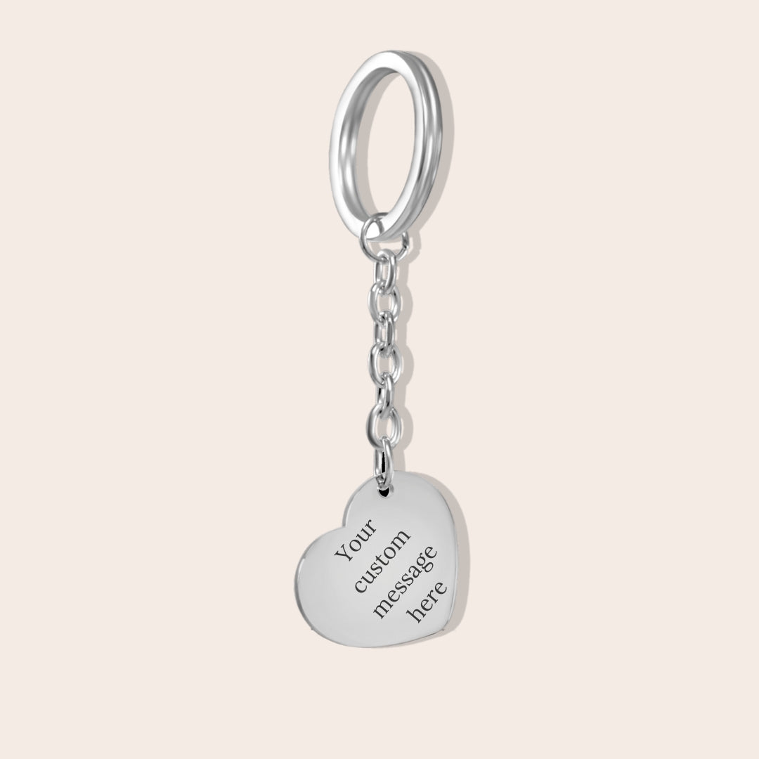 Personalized Initials Heart Keychain in silver. Custom messaging available on back.