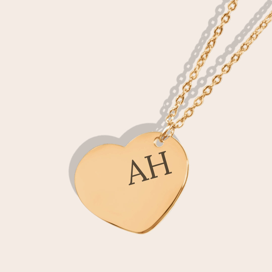 Close up of personalized Initials Heart Necklace Gold. Initials placed on the right side.