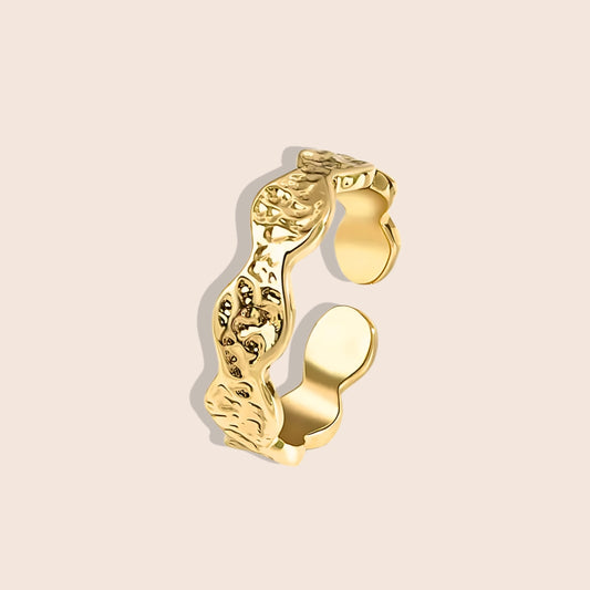 Hutton Hammered Ring in gold, made of stainless steel, features a unique scalloped design with a hammered texture.