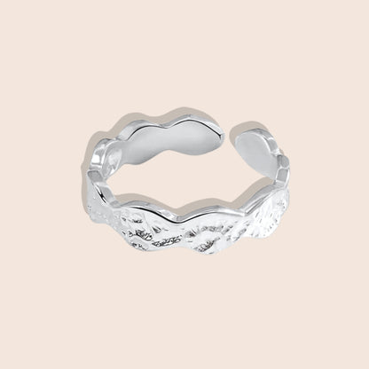 Hutton Hammered Ring in silver, made of stainless steel, features a unique scalloped design with a hammered texture.