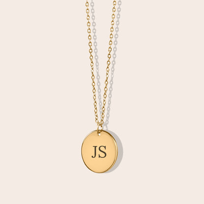 Initials Coin Necklace in gold. Laser engraving available on back side.