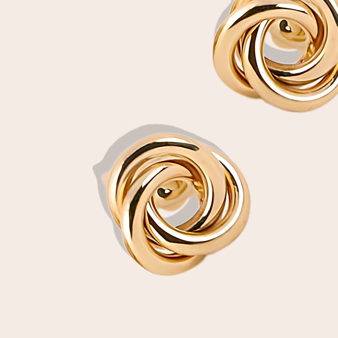 Close up of Kaur Eternal Knot Studs, crafted in 14K gold-filled splendor.