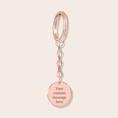 Personalized Couples Initials Coin Keychain in rose gold. Custom messaging in the back.