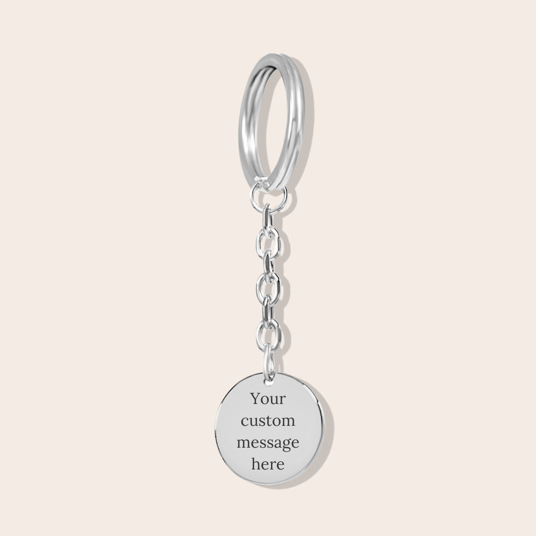 Personalized Couples Initials Coin Keychain in silver. Back side with custom message.