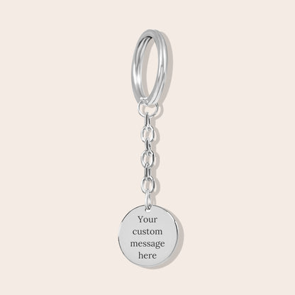 Personalized Couples Initials Coin Keychain in silver. Back side with custom message.