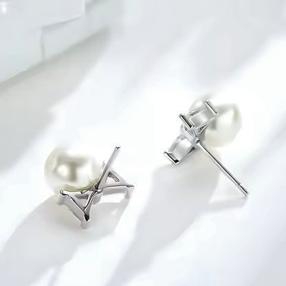 Paloma Pearl Bow Studs backing, crafted from 925 sterling silver and adorned with shimmering zircon stones in silver.