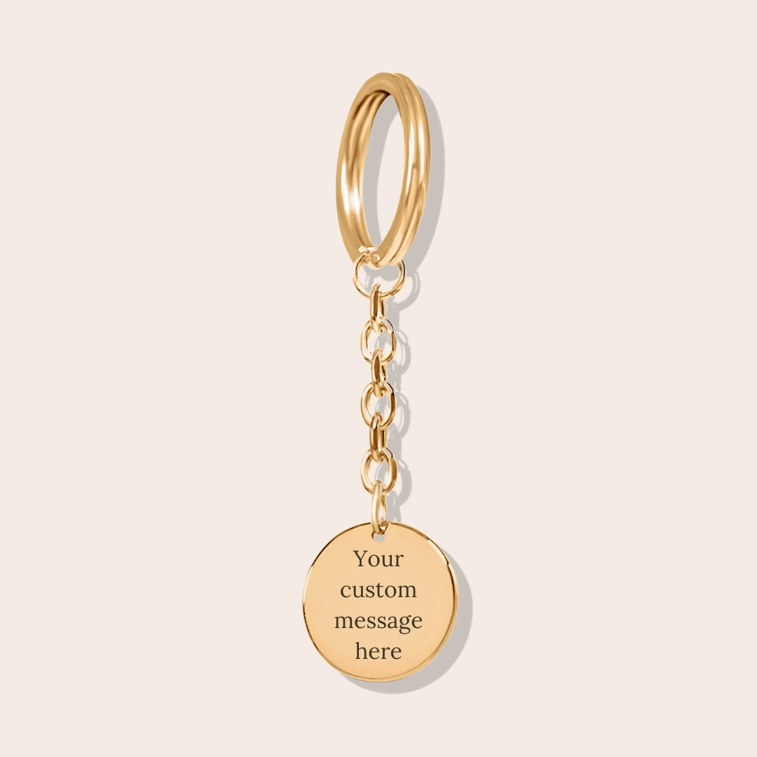 Personalized Initials Coin Keychain in gold. Custom messaging on the back.