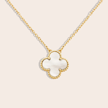 Quirine quatrefoil necklace in pearl white. Crafted from lasting stainless steel and luxuriously gold plated.